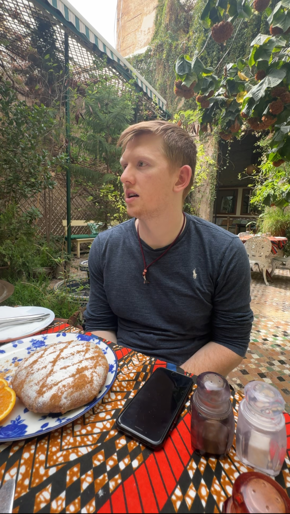 A photo of Jack with a Moroccan B'stilla at the Ruined Garden Restaurant