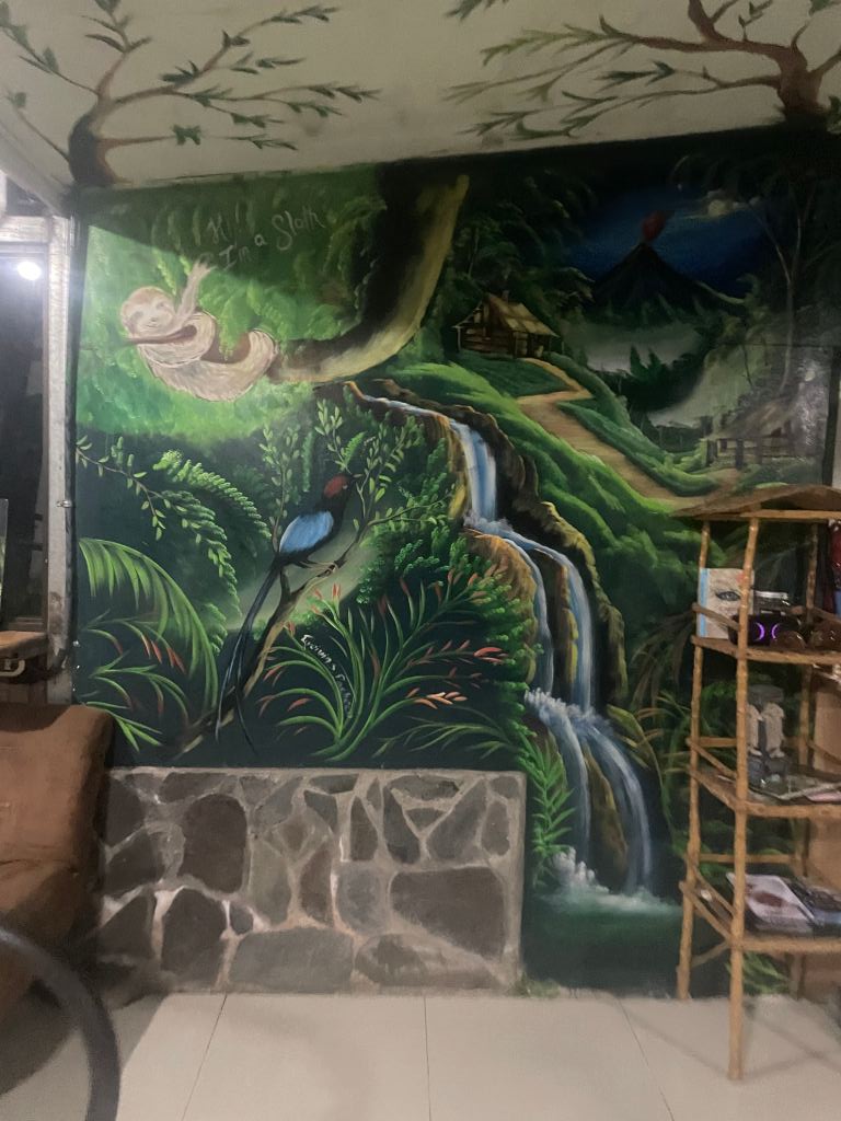 Mural in Monteverde Backpackers Hostel in Costa Rica. Hostel review by Ourtwostepstart