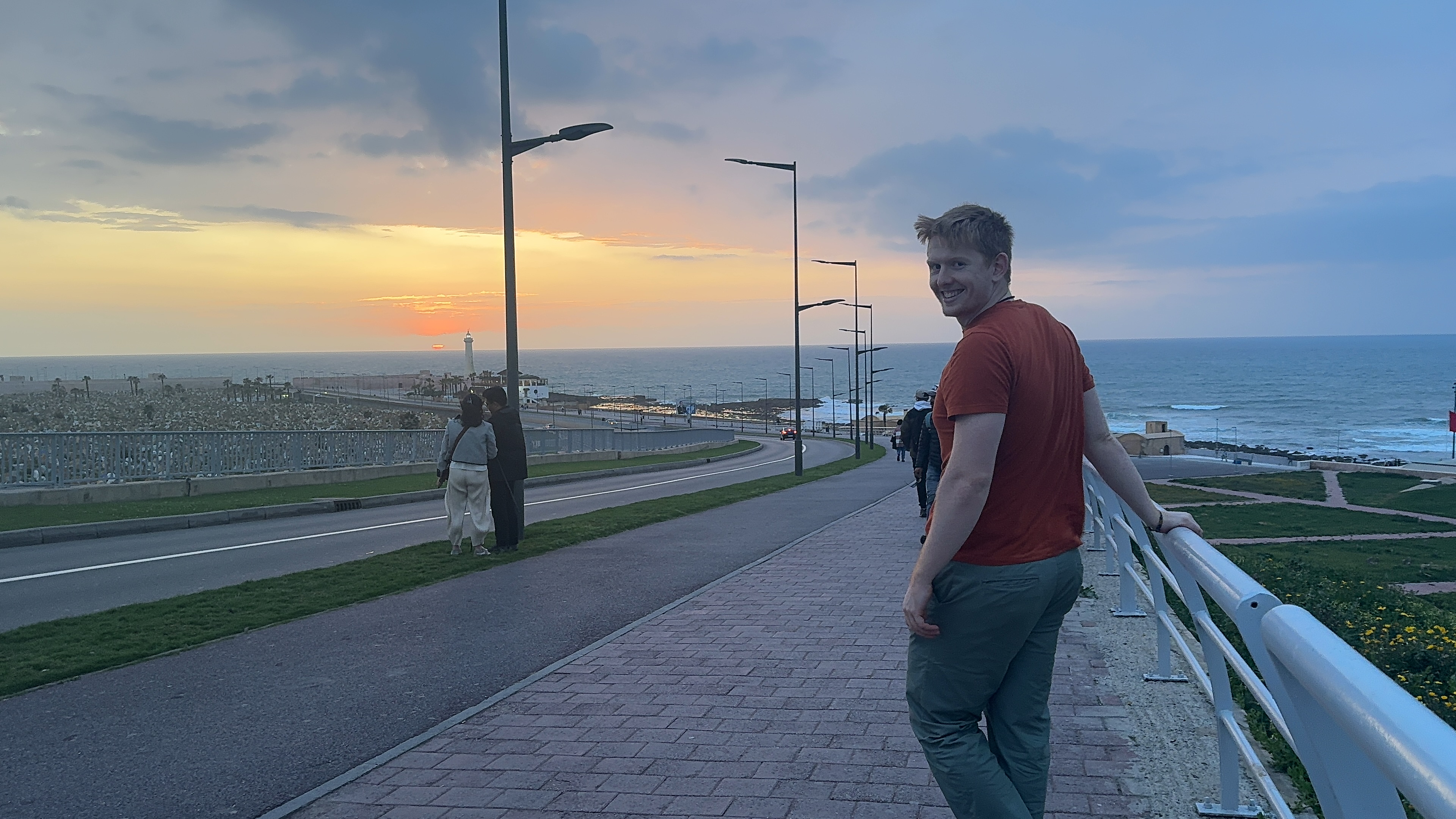 Jack of Ourtwostepstart on Rabat Beach in Morocco. This is a location where we chose not to slow travel, but instead opting for fast travel through Morocco.